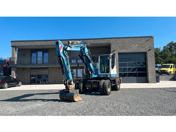 Excavator pe roţi TEREX