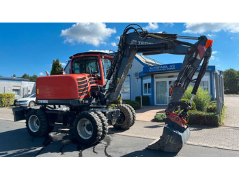 Excavator pe roţi TEREX