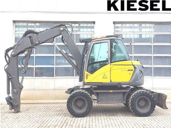 Excavator pe roţi MECALAC