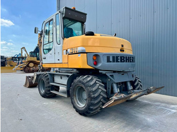 Excavator pe roţi Liebherr A311 Litronic: Foto 2