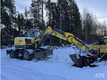 Excavator pe roţi WACKER