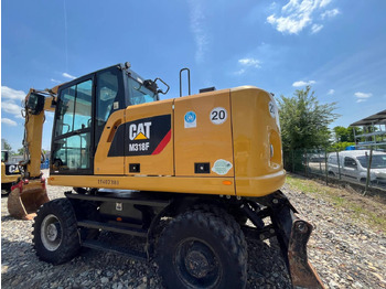 Excavator pe roţi CAT M318F: Foto 4