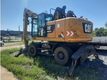 Excavator pe roţi CATERPILLAR MH3024