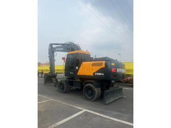 Excavator pe roţi HYUNDAI R210