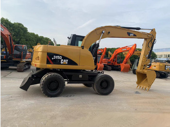 Excavator pe roţi Caterpillar M315D Wheel Excavator Moving by Tires: Foto 3 Excavator pe roţi Caterpillar M315D Wheel Excavator Moving by Tires: Foto 3