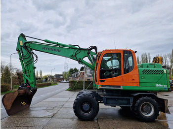 Excavator pe roţi HYUNDAI