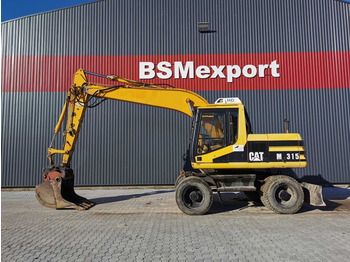 Excavator pe roţi CATERPILLAR M315