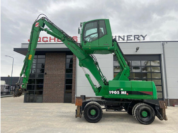 Excavator pe roţi TEREX