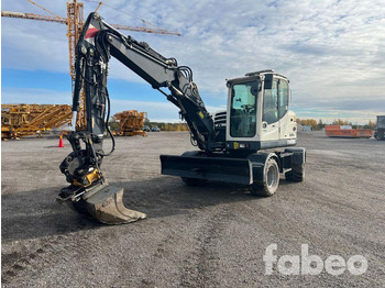 Excavator pe roţi TEREX