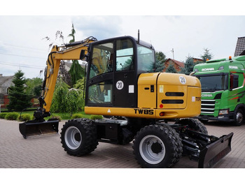 Excavator pe roţi TEREX