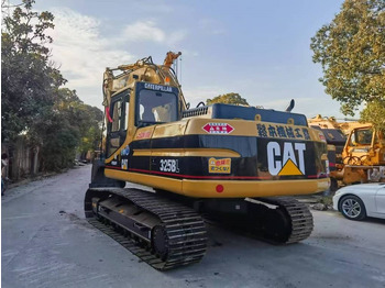 Excavator pentru manipulare de materiale CATERPILLAR