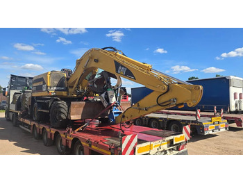 Excavator pe roţi CATERPILLAR M312