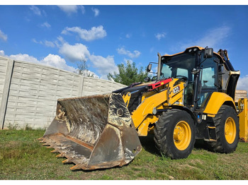 Buldoexcavator CATERPILLAR
