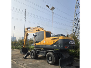 Excavator pe roţi HYUNDAI R210