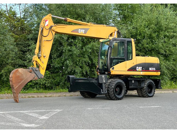 Excavator pe roţi CATERPILLAR M315C