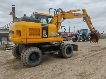 Excavator pe roţi Komatsu PW140-7: Foto 3