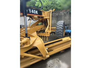 Autogreder CATERPILLAR 140K: Foto 2
