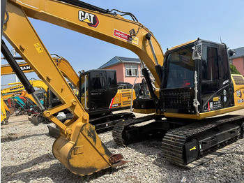 Excavator pe roţi CATERPILLAR 312D