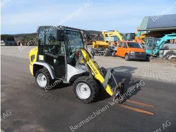 Încărcător frontal pe pneuri KRAMER