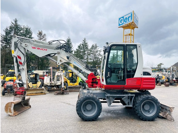 Excavator pe roţi TAKEUCHI