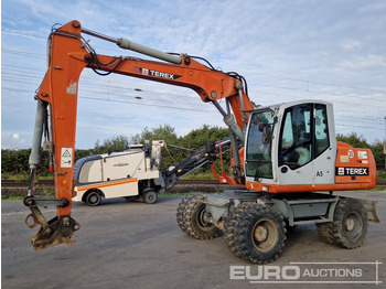 Excavator pe roţi TEREX