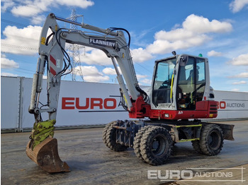 Excavator pe roţi TAKEUCHI