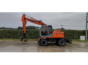 Excavator pe roţi NEW HOLLAND