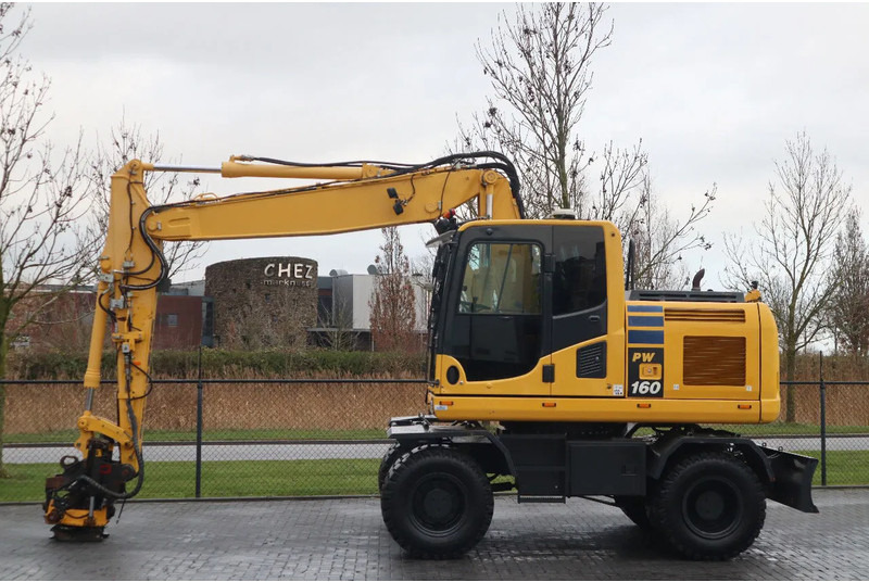 Komatsu PW 160-10 | ROTOTILT | NEW TIRES - Excavator pe roţi: Foto 1 Komatsu PW 160-10 | ROTOTILT | NEW TIRES - Excavator pe roţi: Foto 1