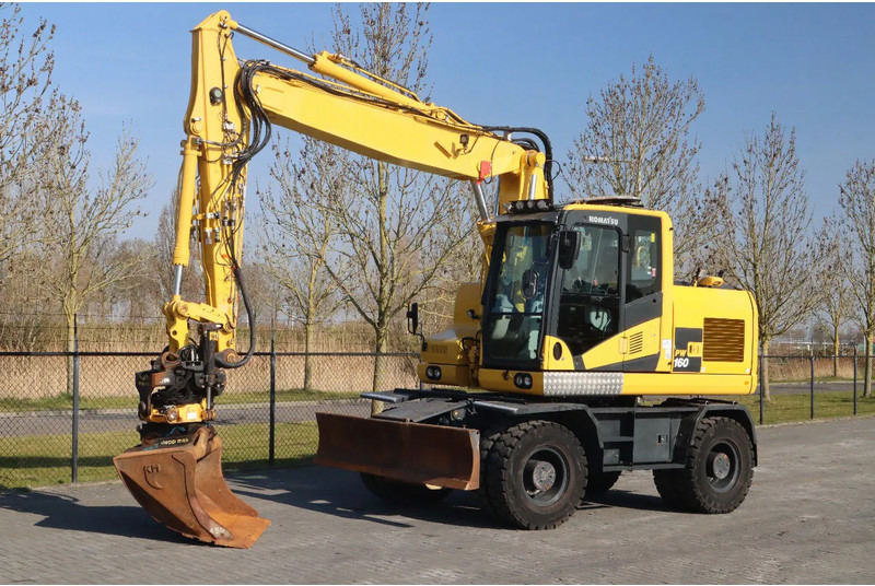 Komatsu PW160-11 | ENGCON TILTROTATOR | BUCKET | TRAILER HYDR. - Excavator pe roţi: Foto 2 Komatsu PW160-11 | ENGCON TILTROTATOR | BUCKET | TRAILER HYDR. - Excavator pe roţi: Foto 2