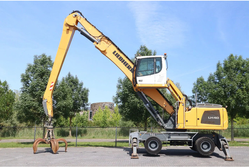 Liebherr LH 40 M LITRONIC | GRAB | QUICK COUPLER | 16 METER - Excavator pe roţi: Foto 1 Liebherr LH 40 M LITRONIC | GRAB | QUICK COUPLER | 16 METER - Excavator pe roţi: Foto 1