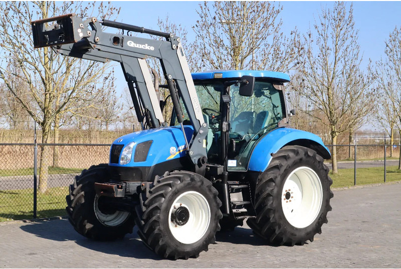 New Holland T6040 | FRONT LOADER | 50KM/H | QUICK COUPLER - Tractor agricol: Foto 2 New Holland T6040 | FRONT LOADER | 50KM/H | QUICK COUPLER - Tractor agricol: Foto 2