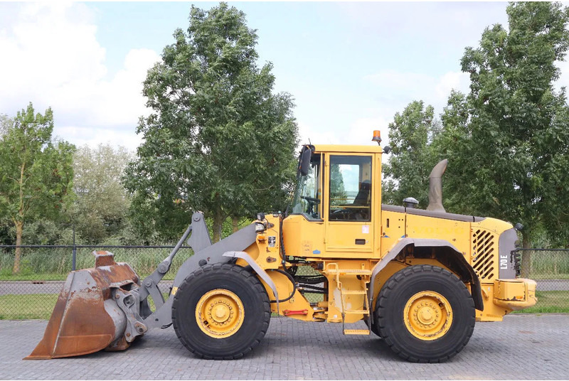 Volvo L70E | BUCKET | QUICK COUPLER | EXTRA FUNCT | AIRCO - Încărcător frontal pe pneuri: Foto 1 Volvo L70E | BUCKET | QUICK COUPLER | EXTRA FUNCT | AIRCO - Încărcător frontal pe pneuri: Foto 1