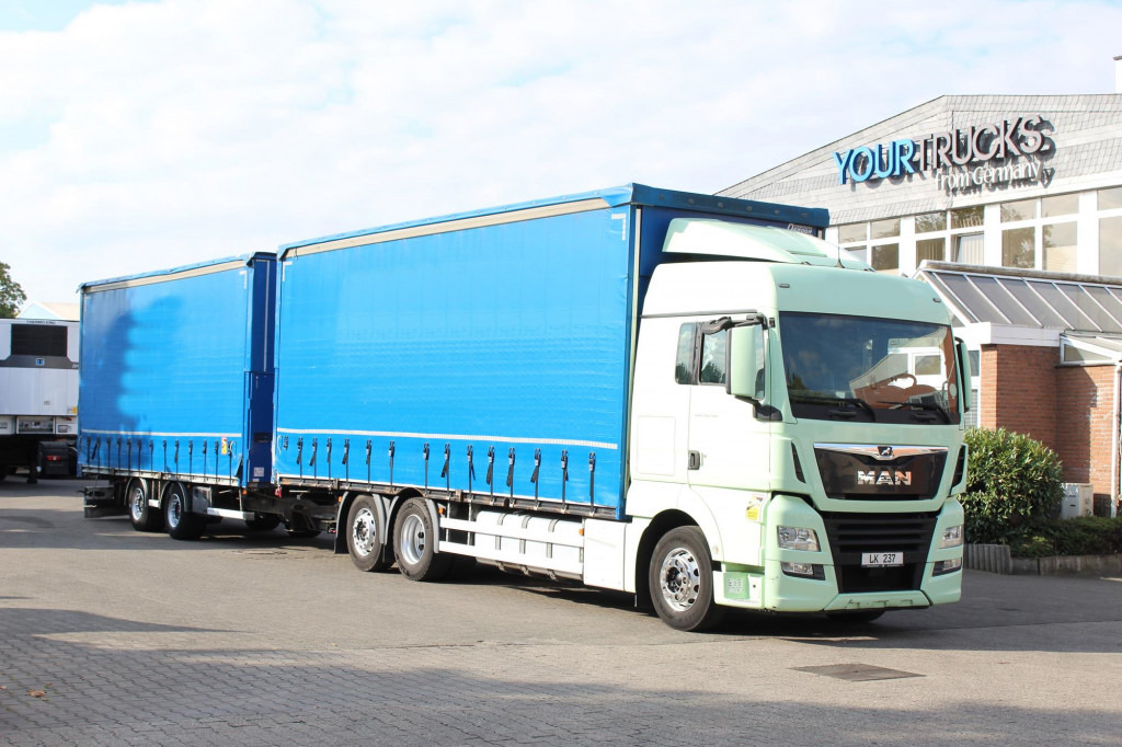 MAN TGX 26.460 Retarder Jumbo-Zug 120M3 Durchlade - Camion cu prelată: Foto 1 MAN TGX 26.460 Retarder Jumbo-Zug 120M3 Durchlade - Camion cu prelată: Foto 1