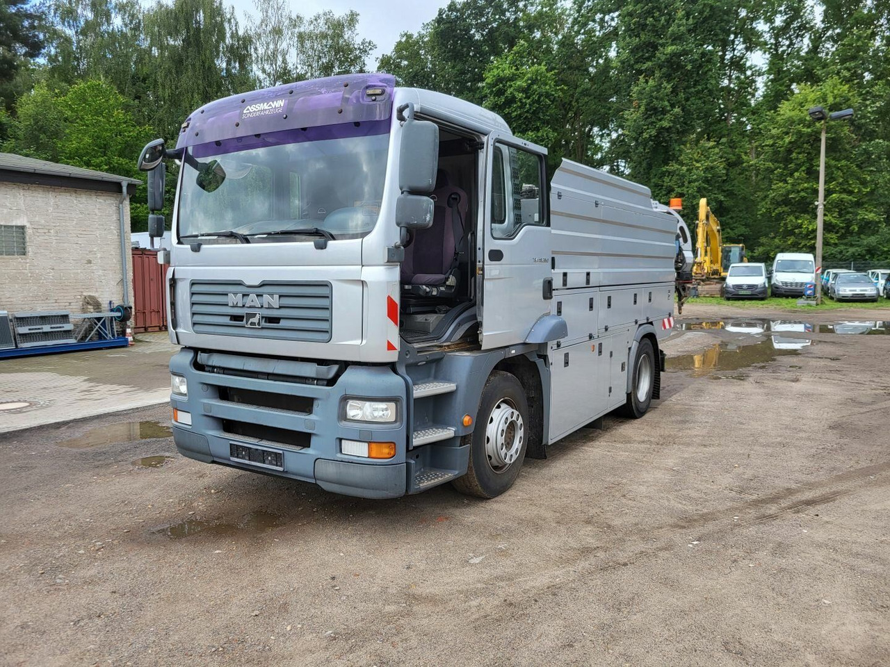 MAN TGA 18.360 4x2 HD-Kanalreiniger ASSMANN 6500 L - Maşină pentru vidanjări: Foto 2 MAN TGA 18.360 4x2 HD-Kanalreiniger ASSMANN 6500 L - Maşină pentru vidanjări: Foto 2