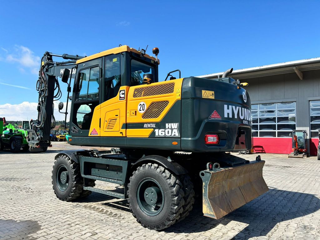Hyundai HW160A Hyundai HW160A - Excavator pe roţi: Foto 2 Hyundai HW160A Hyundai HW160A - Excavator pe roţi: Foto 2