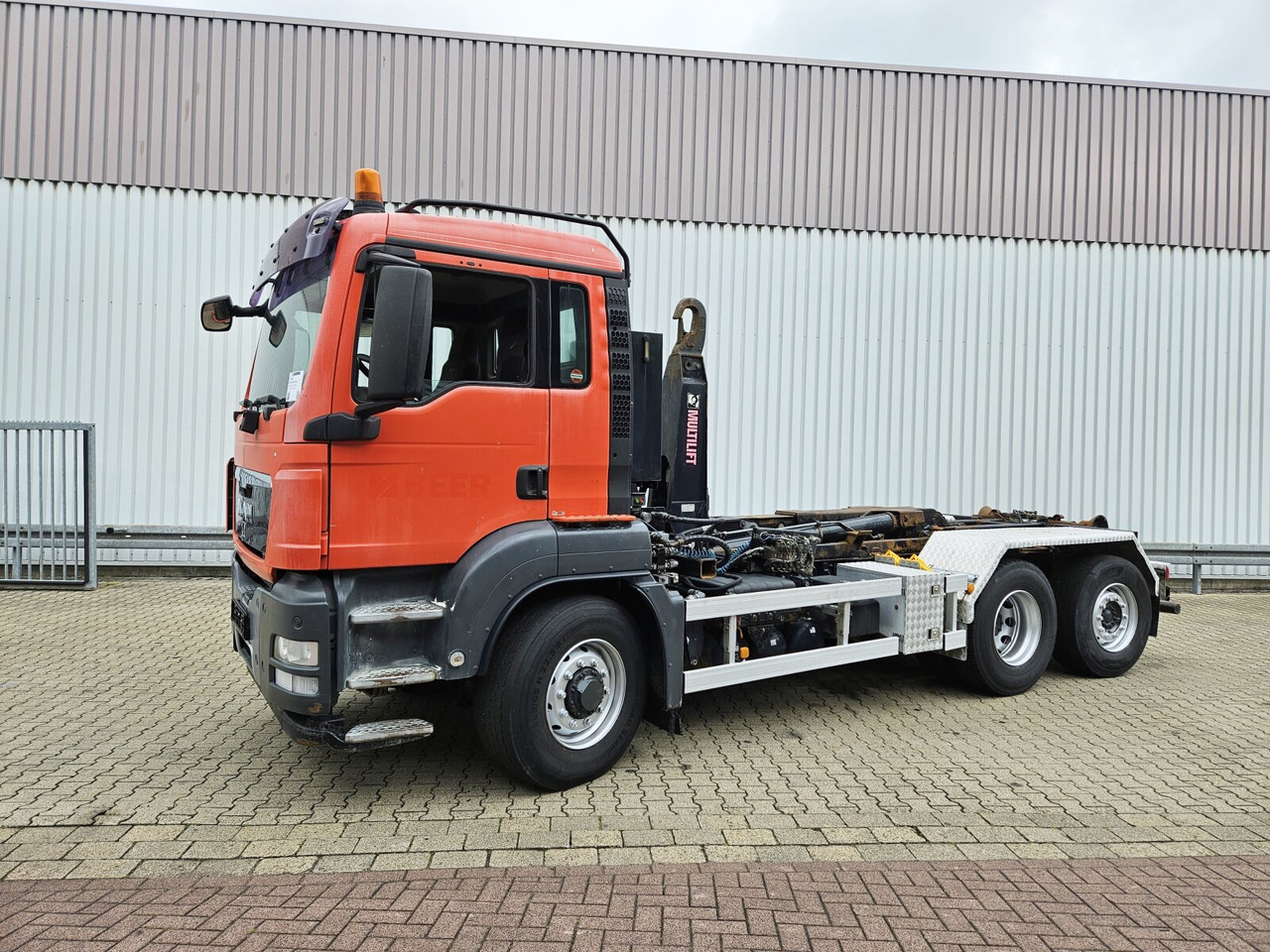 MAN TGS 26.480 6x4H-4 BL TGS 26.480 6x4H-4 BL, Multilift Abroller HydroDrive, Lenk-/Liftachse, Wechselfahrzeug - Camion cu cârlig: Foto 1 MAN TGS 26.480 6x4H-4 BL TGS 26.480 6x4H-4 BL, Multilift Abroller HydroDrive, Lenk-/Liftachse, Wechselfahrzeug - Camion cu cârlig: Foto 1