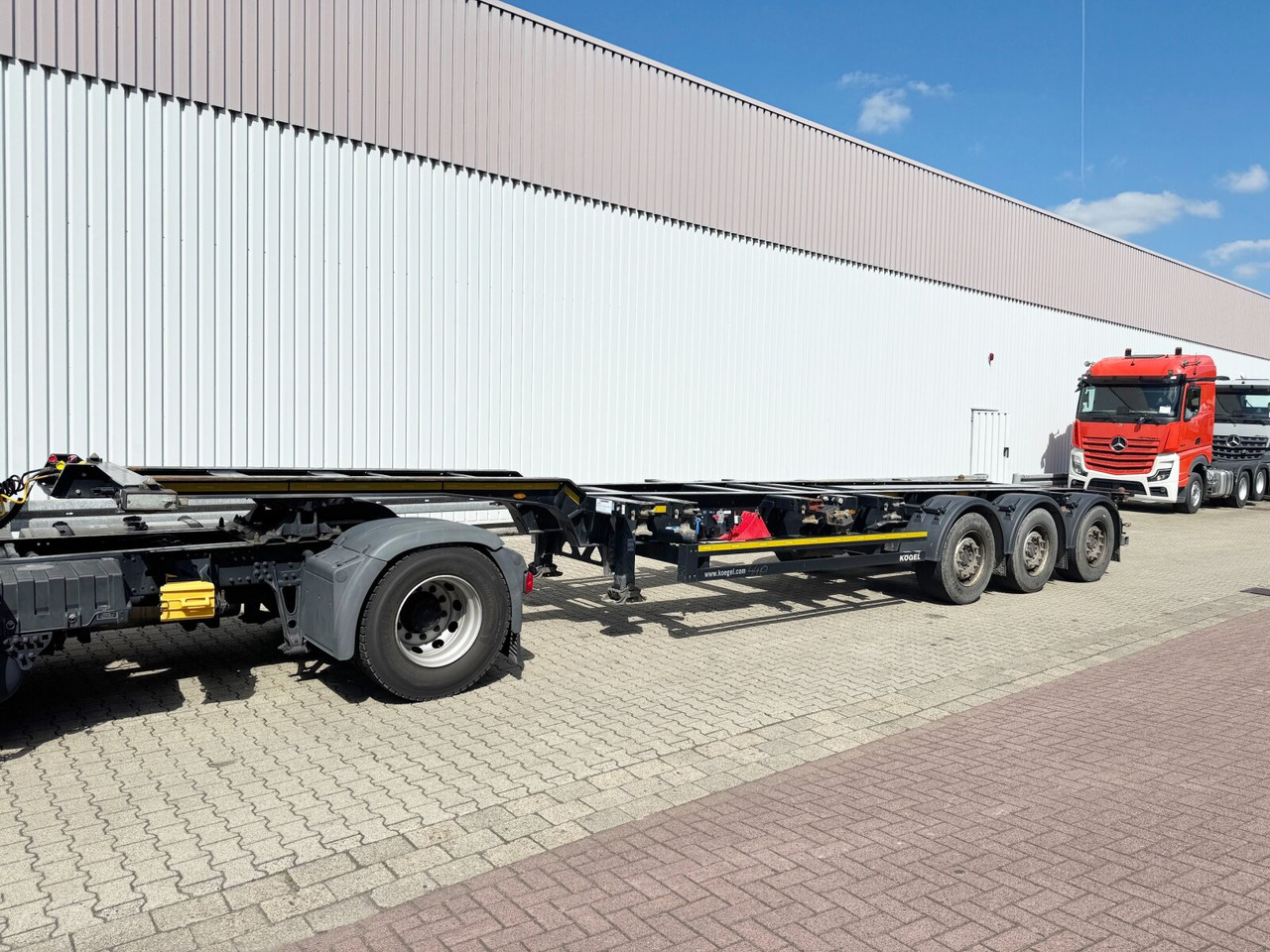 Kögel Port 45 Simplex Container-Chassis Port 45 Simplex, Container-Chassis, 20/2x20/30/40/45 Fuß, ausziehbar - Semiremorcă: Foto 1 Kögel Port 45 Simplex Container-Chassis Port 45 Simplex, Container-Chassis, 20/2x20/30/40/45 Fuß, ausziehbar - Semiremorcă: Foto 1