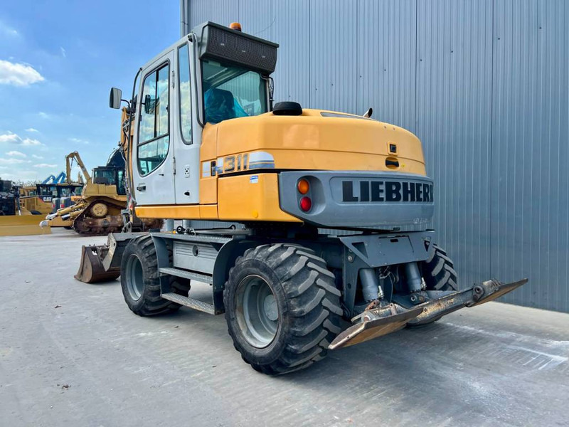 Liebherr A311 Litronic - Excavator pe roţi: Foto 2 Liebherr A311 Litronic - Excavator pe roţi: Foto 2