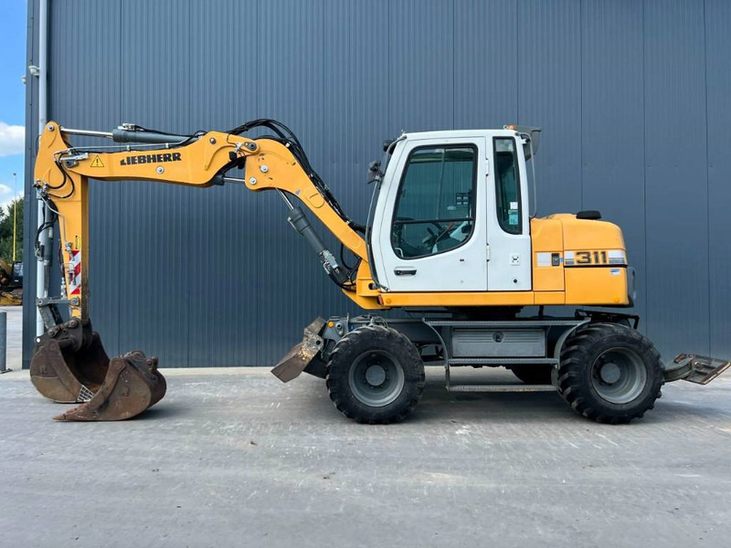 Liebherr A311 Litronic - Excavator pe roţi: Foto 5 Liebherr A311 Litronic - Excavator pe roţi: Foto 5
