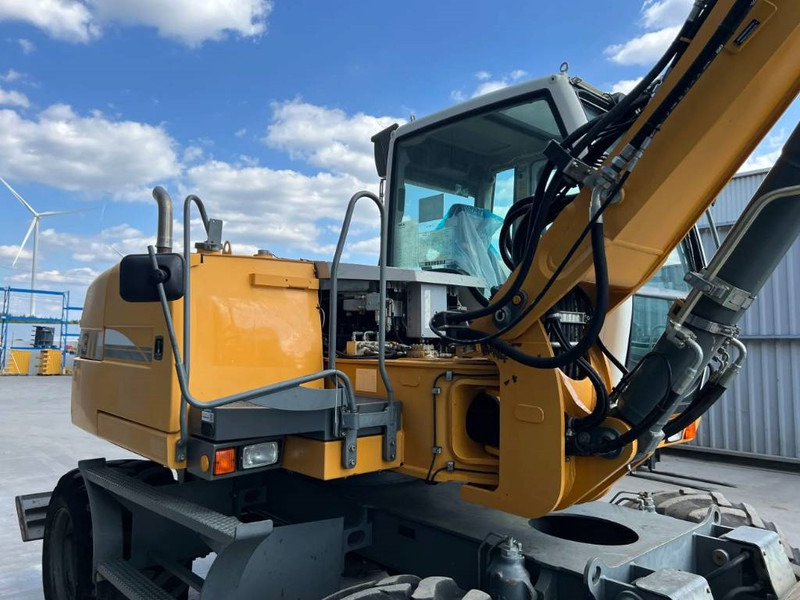 Excavator pe roţi Liebherr A311 Litronic: Foto 15