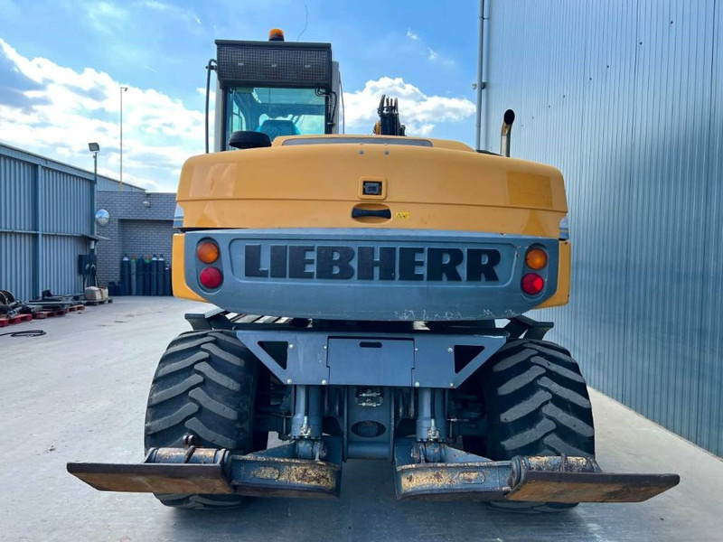 Excavator pe roţi Liebherr A311 Litronic: Foto 7