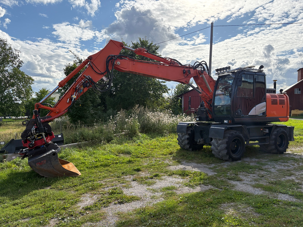 Hitachi ZX140W-6 - Excavator: Foto 1 Hitachi ZX140W-6 - Excavator: Foto 1