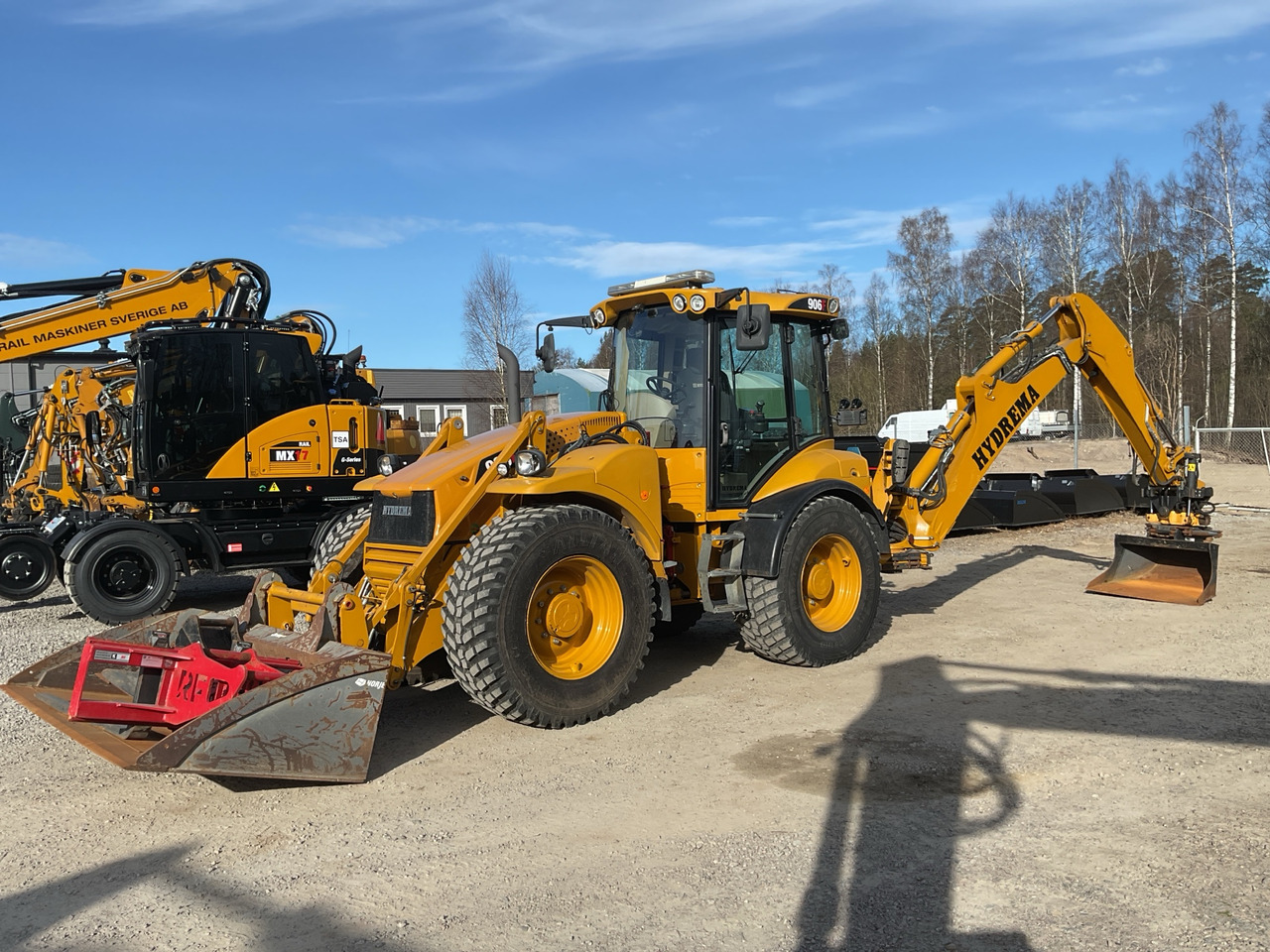 Hydrema 906F - Buldoexcavator: Foto 1 Hydrema 906F - Buldoexcavator: Foto 1