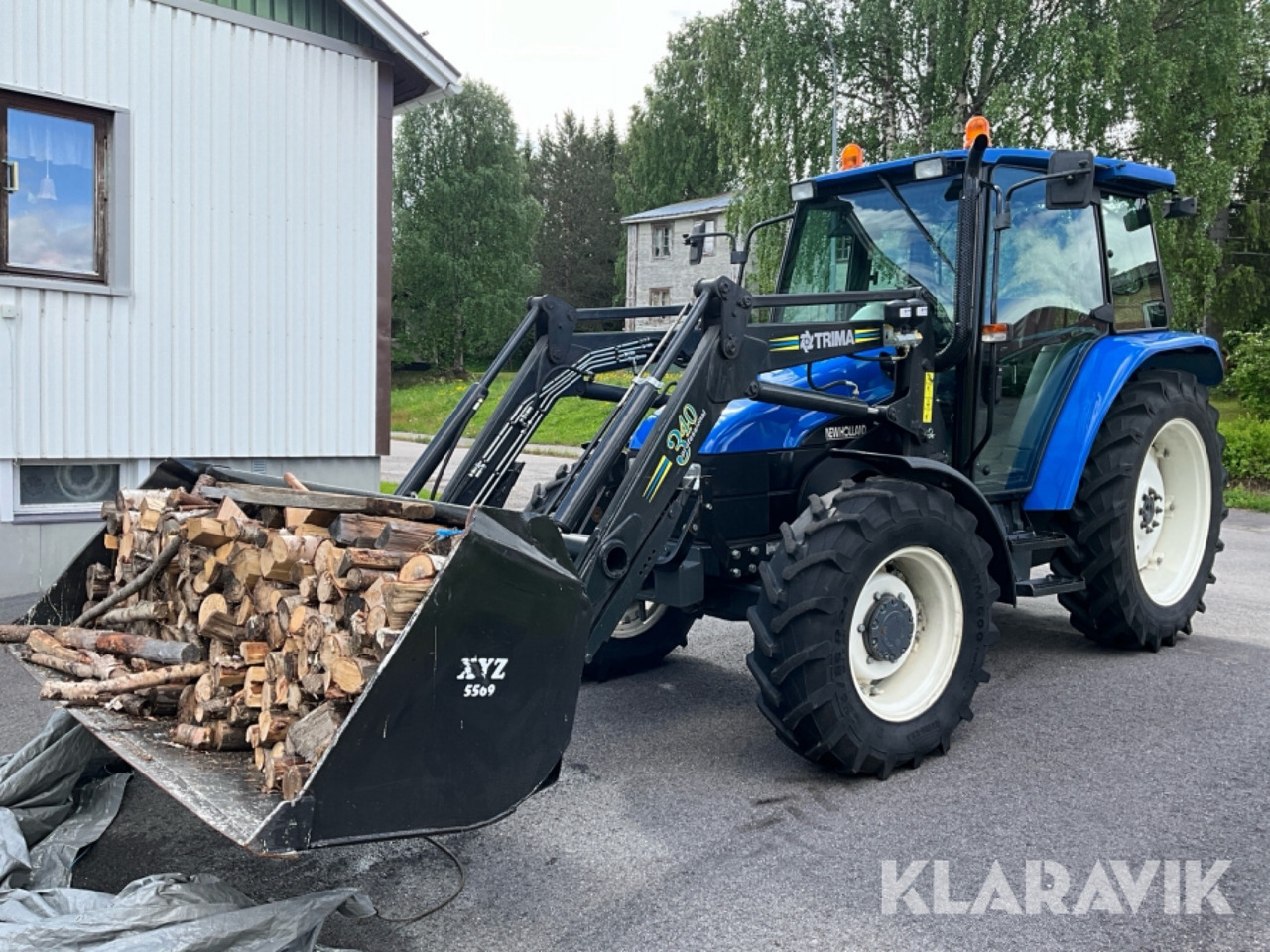 New Holland TL 70 - Tractor agricol: Foto 1 New Holland TL 70 - Tractor agricol: Foto 1