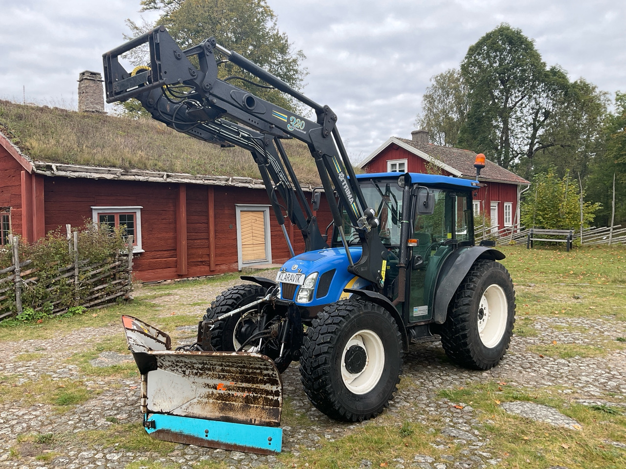 New Holland TN75SA - Tractor agricol: Foto 1 New Holland TN75SA - Tractor agricol: Foto 1