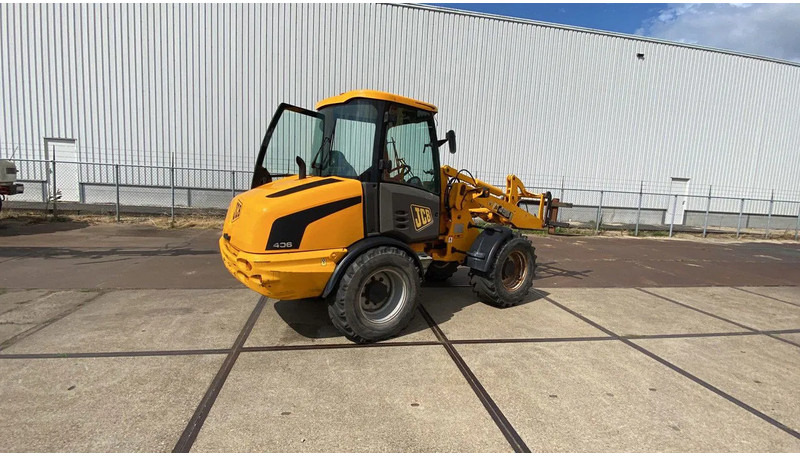 JCB KNIKSCHOVEL 406 - Încărcător frontal pe pneuri: Foto 4 JCB KNIKSCHOVEL 406 - Încărcător frontal pe pneuri: Foto 4