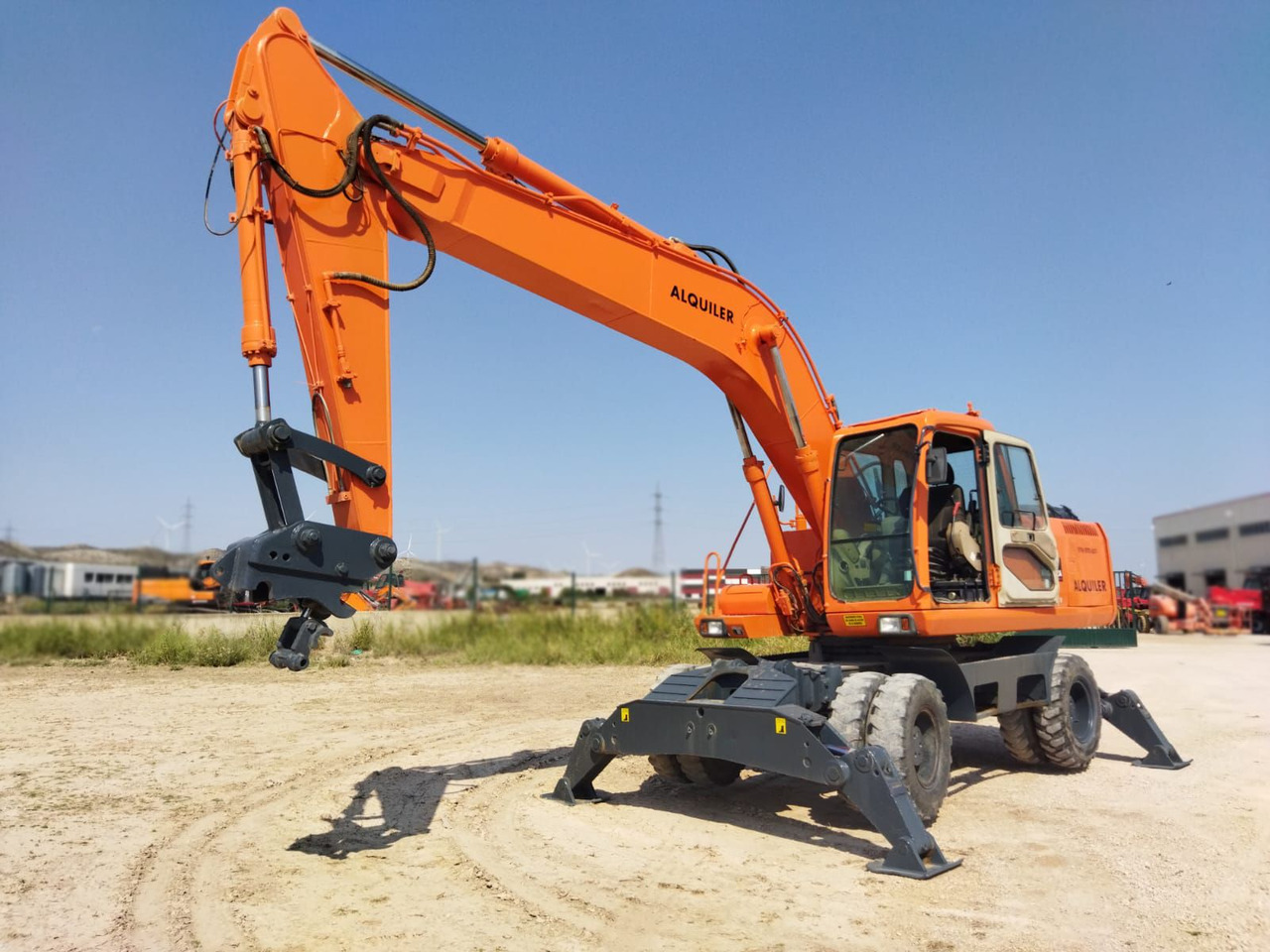DAEWOO 210 W-V M4E (LOC) - Excavator pe roţi: Foto 1 DAEWOO 210 W-V M4E (LOC) - Excavator pe roţi: Foto 1