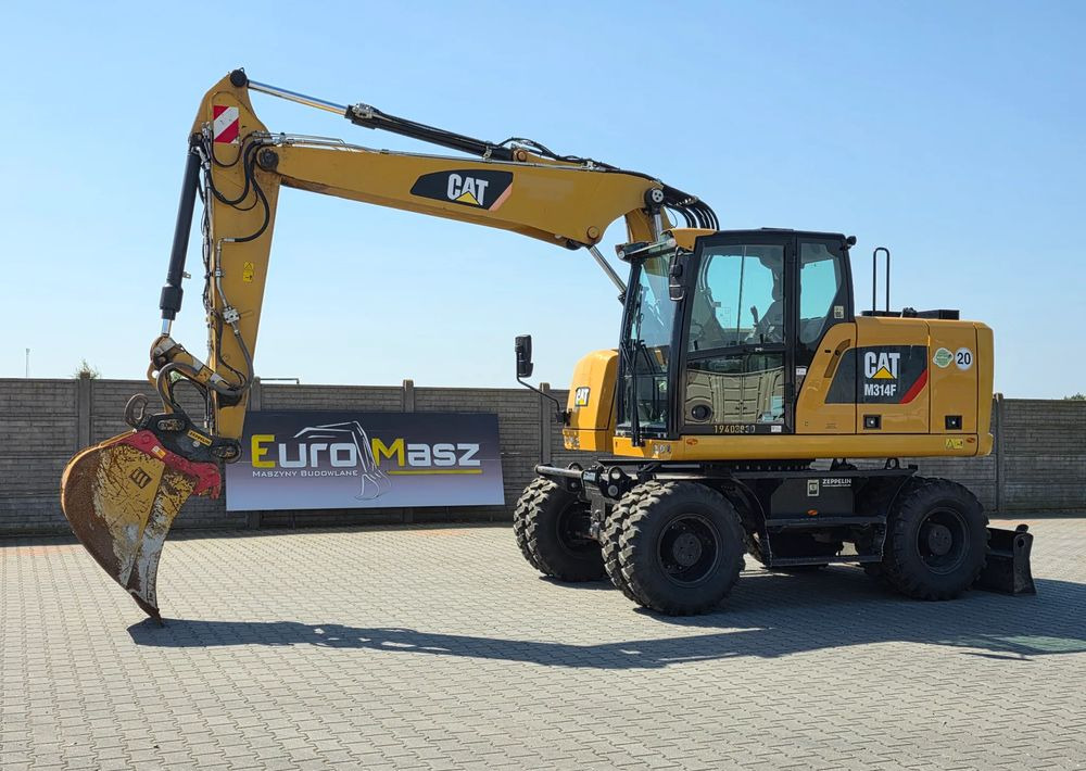Caterpillar M314F, 2019 ROK, 3300 MTH, OIL QUICK OQ 65 - Excavator pe roţi: Foto 1 Caterpillar M314F, 2019 ROK, 3300 MTH, OIL QUICK OQ 65 - Excavator pe roţi: Foto 1