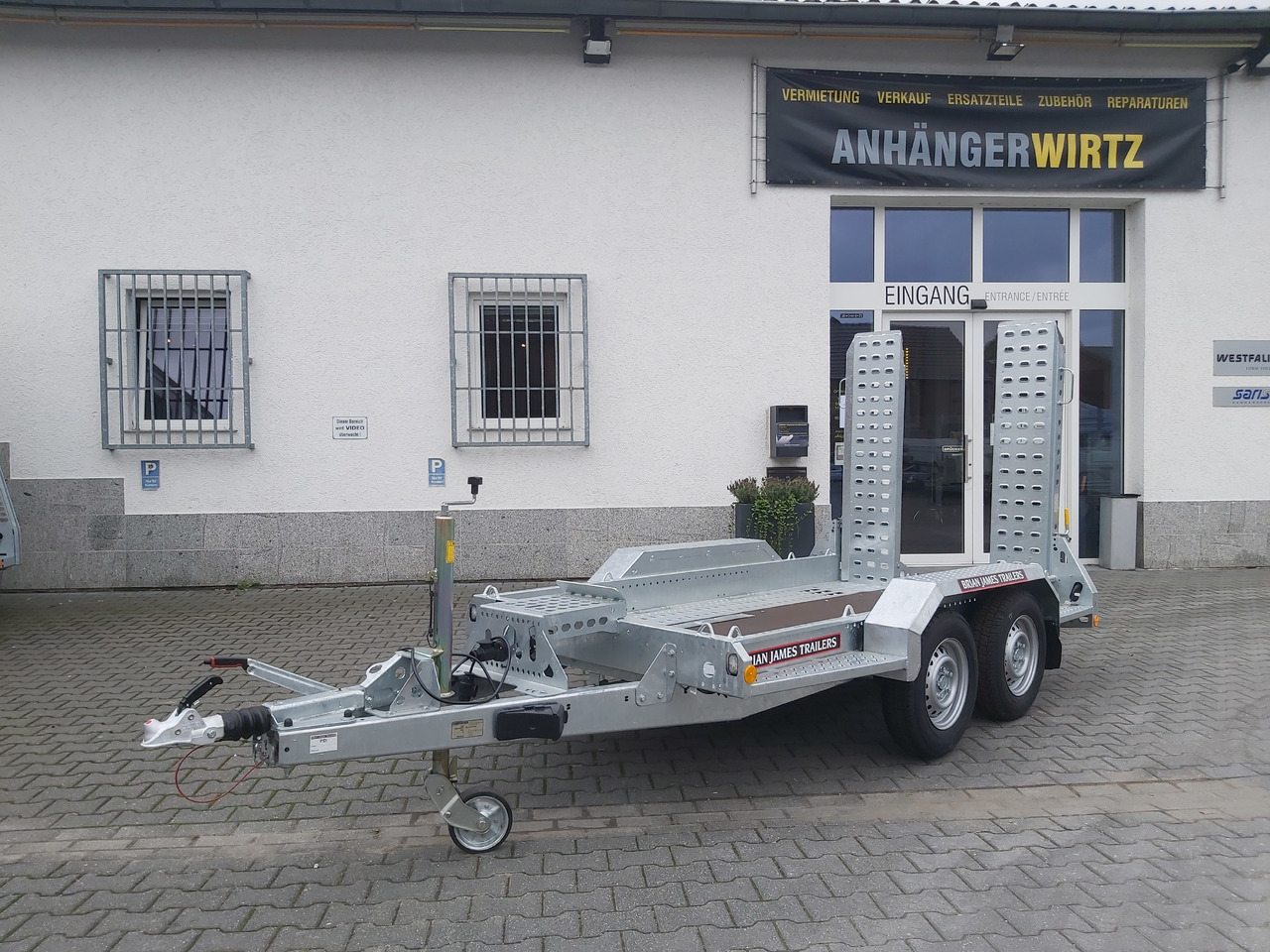 Brian James Digger Plant 543-2813-27 280x130cm Schaufelablage Rampen Reserverad 2700kg Aktion - Remorcă transport utilaje: Foto 5 Brian James Digger Plant 543-2813-27 280x130cm Schaufelablage Rampen Reserverad 2700kg Aktion - Remorcă transport utilaje: Foto 5