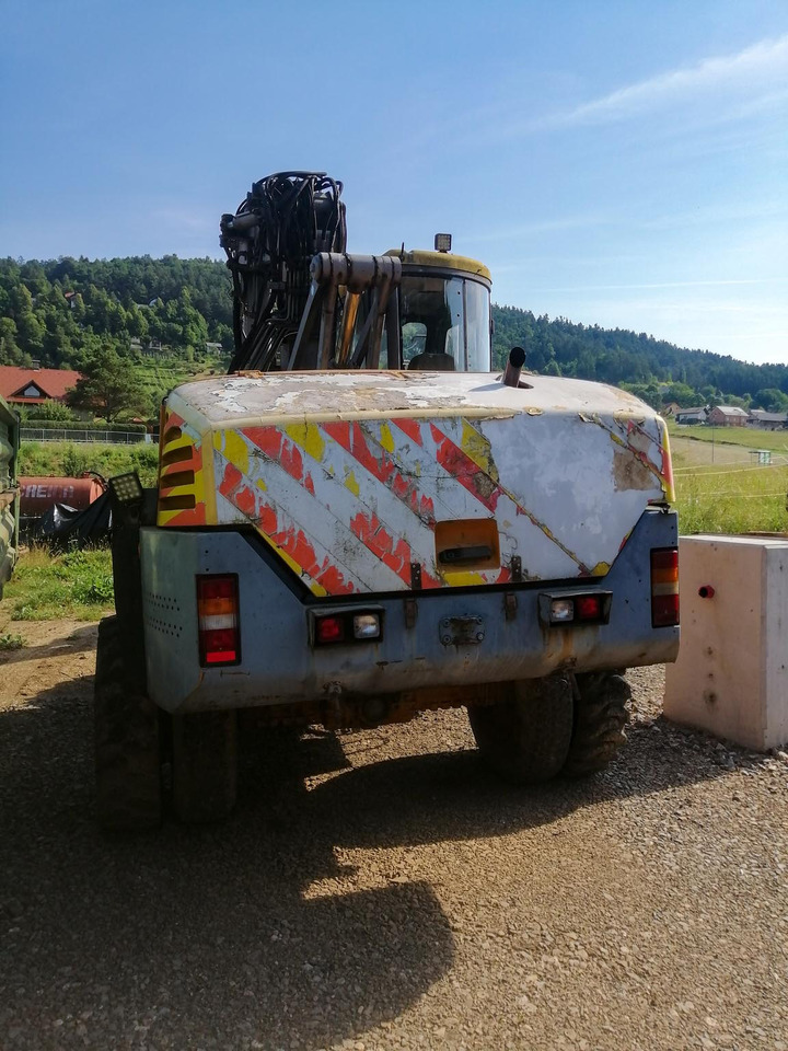 MECALAC 14 MXT - Excavator pe roţi: Foto 2 MECALAC 14 MXT - Excavator pe roţi: Foto 2